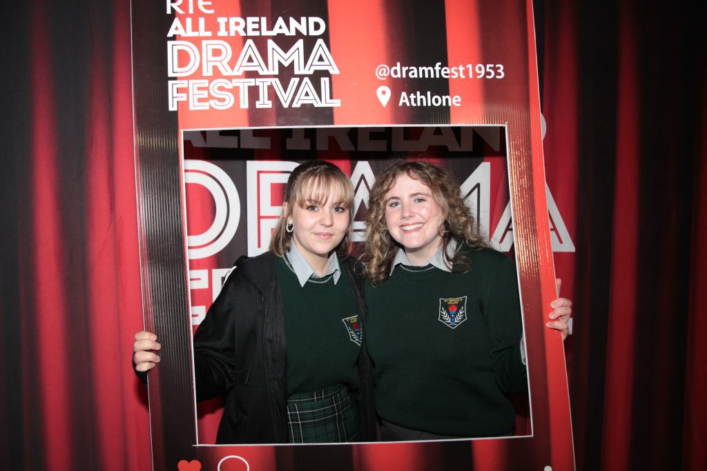 Students holding Frame